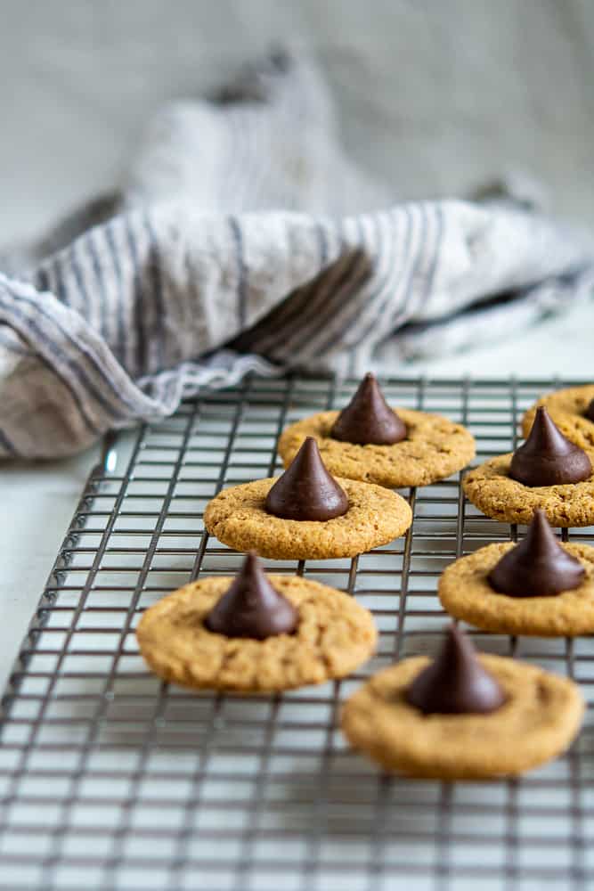 Almond Butter Bloosom Cookie photo on a baking rack with dishcloth