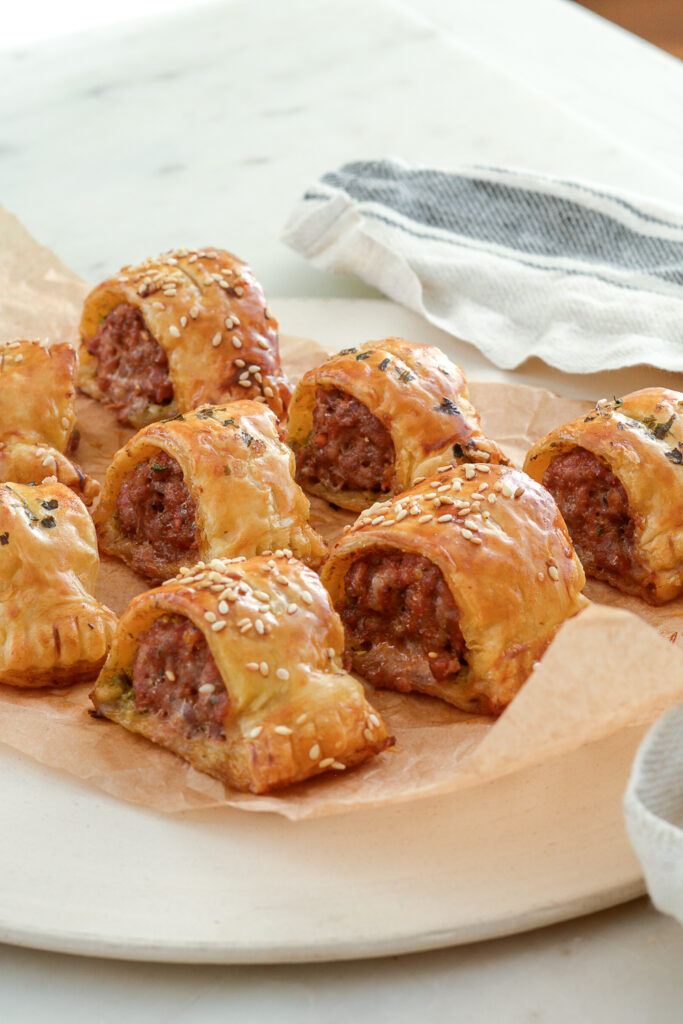 sausage rolls on a flat plate