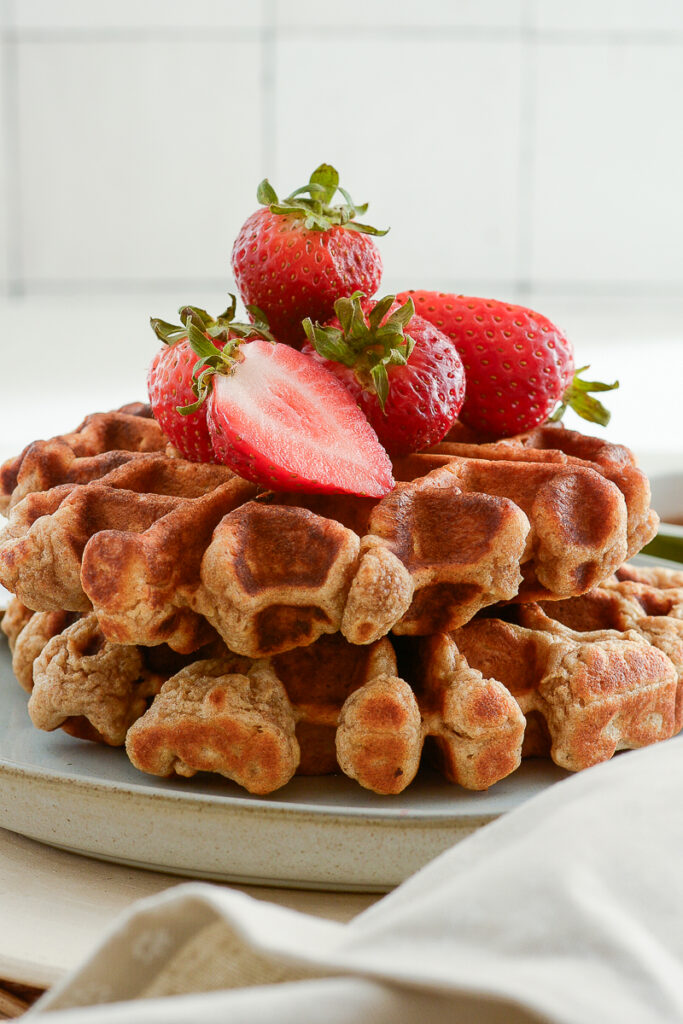 sourdough whole grain waffles with strawberries on a plate