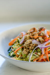 Chicken Larb Napa Salad in a bowl